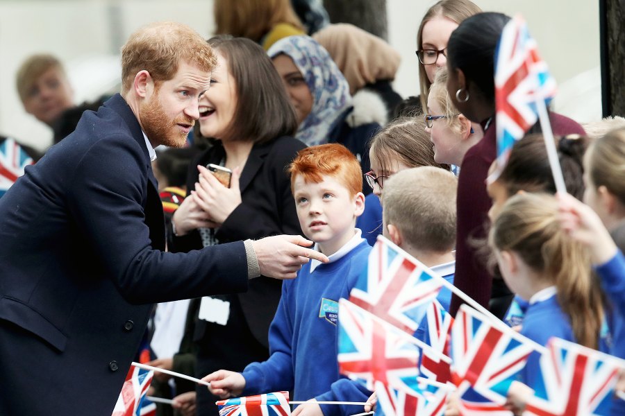Prince Harry and Meghan Markle Hug Kids at Royal Engagement