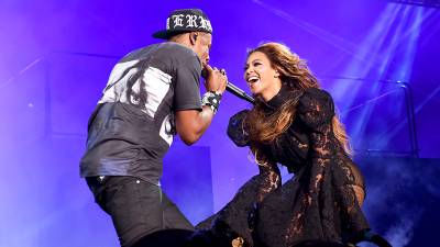 Jay Z and Beyonce perform on stage during the 'On the Run' tour at Soldier Field in Chicago.