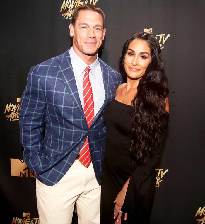 John Cena and Nikki Bella attend the 2017 MTV Movie And TV Awards at The Shrine Auditorium in Los Angeles, California.