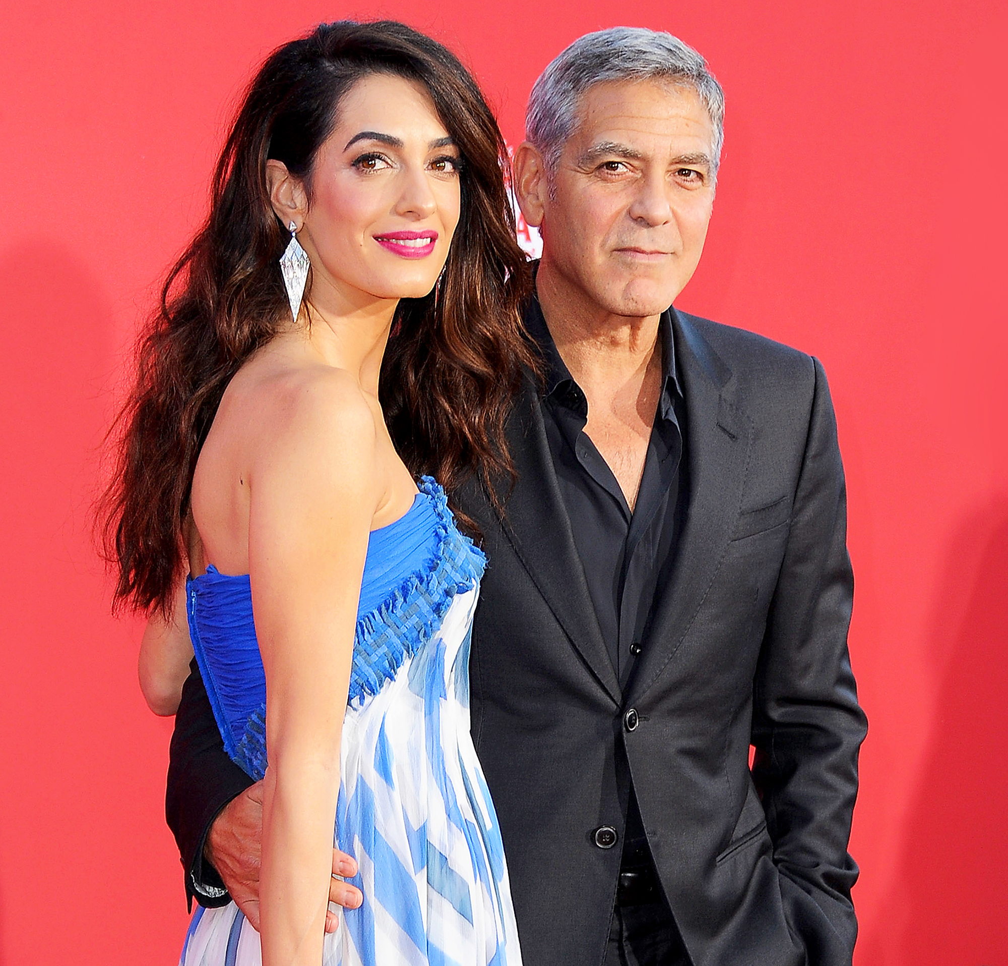 George Clooney and Amal Clooney arrive at the Los Angeles premiere of 'Suburbicon' at Regency Village Theatre on October 22, 2017.