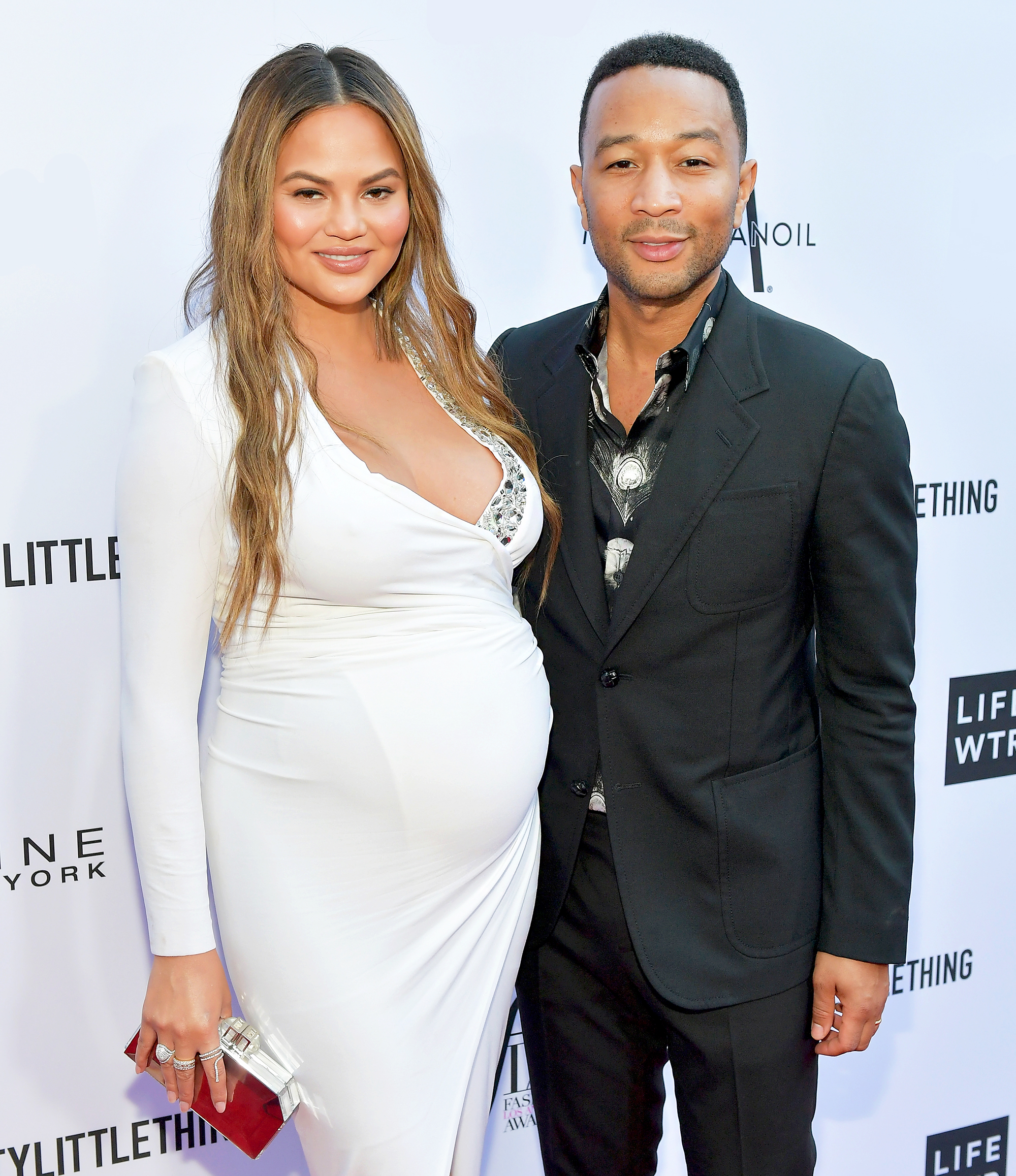 Chrissy Teigen and John Legend attend The Daily Front Row's 4th Annual Fashion Los Angeles Awards at Beverly Hills Hotel on April 8, 2018 in Beverly Hills, California.