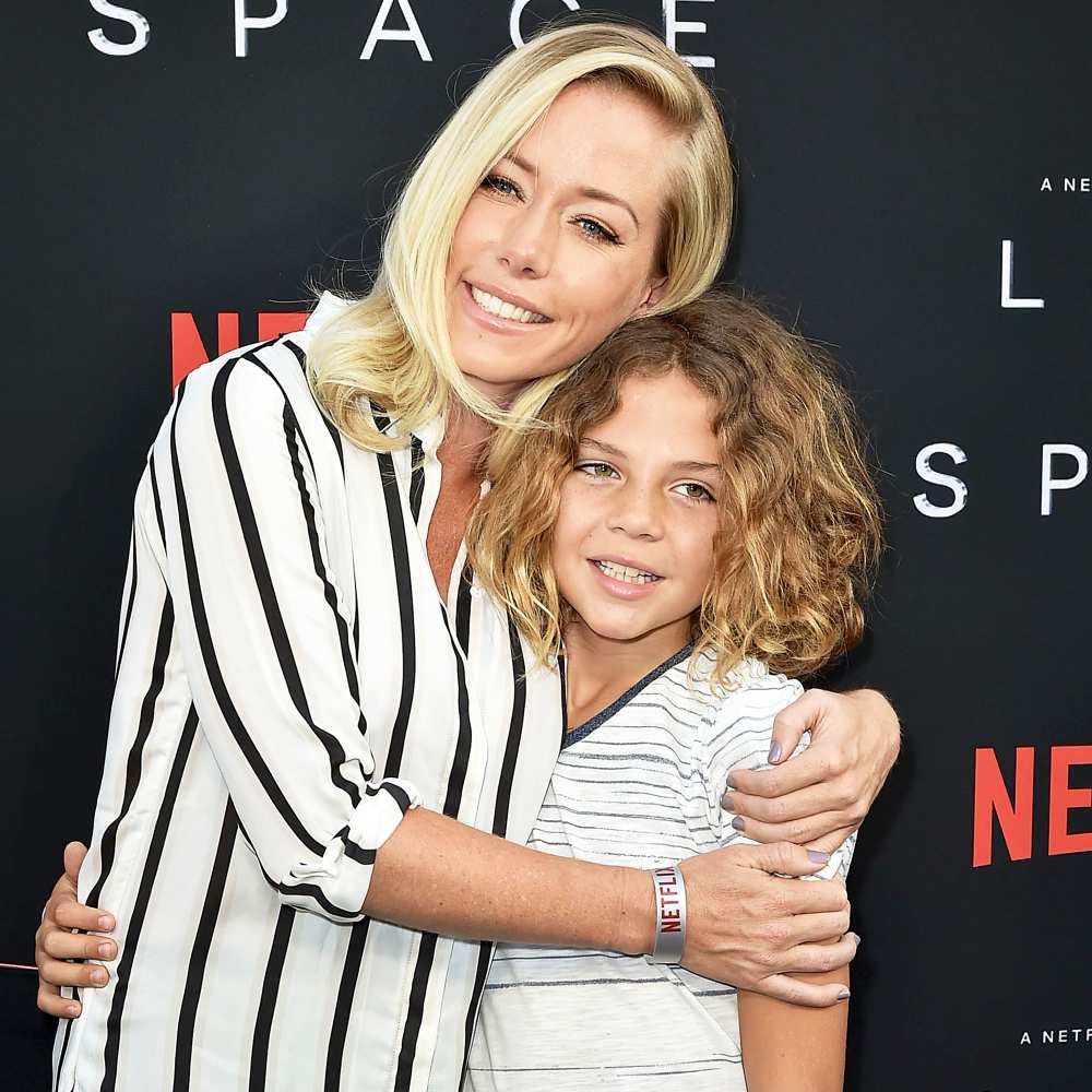 Kendra Wilkinson and son Hank Baskett IV attend the "Lost In Space" Season 1 Premiere at ArcLight Cinerama Dome on April 9, 2018 in Hollywood, California.