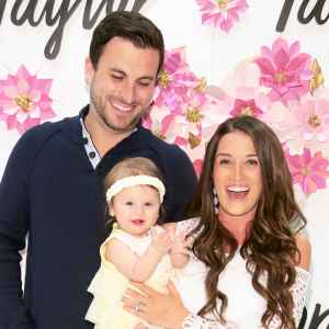 Tanner Tolbert and Jade Roper and daughter Emerson celebrate Mother's Day At Lord & Taylor Fifth Avenue on April 26, 2018 in New York City.