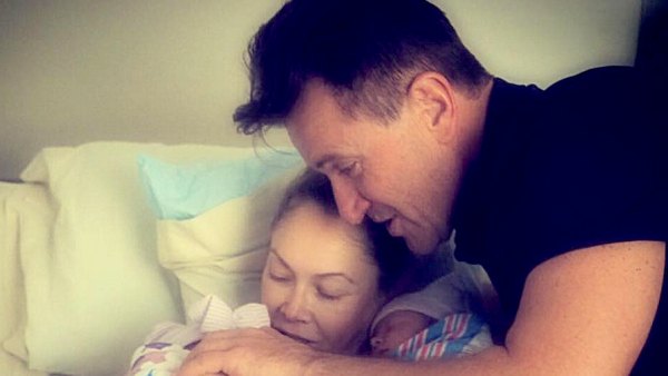 Kym Johnson and Robert Herjavec and their twins