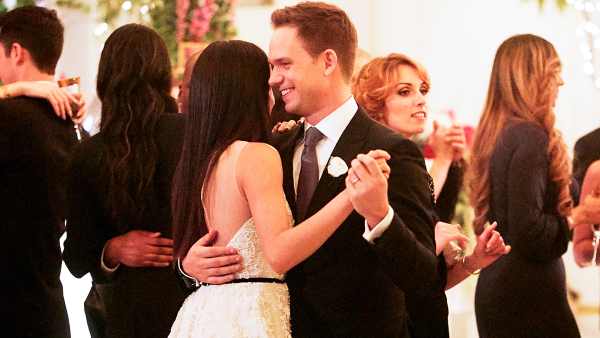 Patrick J. Adams as Mike Ross and Meghan Markle as Rachel Zane in ‘Suits‘