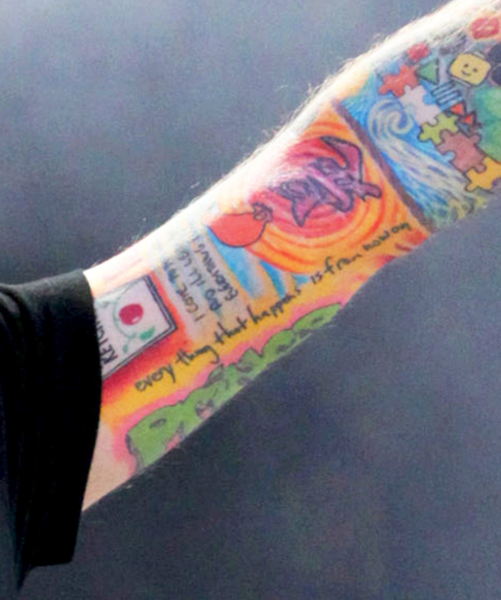 Ed Sheeran’s arm of tattoos while her performs at 2014 Pinkpop at Megaland in Landgraaf, Netherlands.