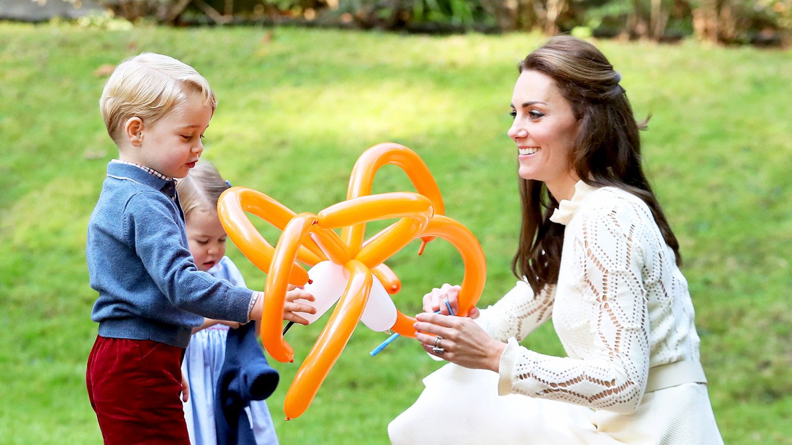 Kate Middleton with Princess Charlotte and Prince George at a children's party for Military families during the 2016 Royal Tour of Canada in Victoria, Canada.