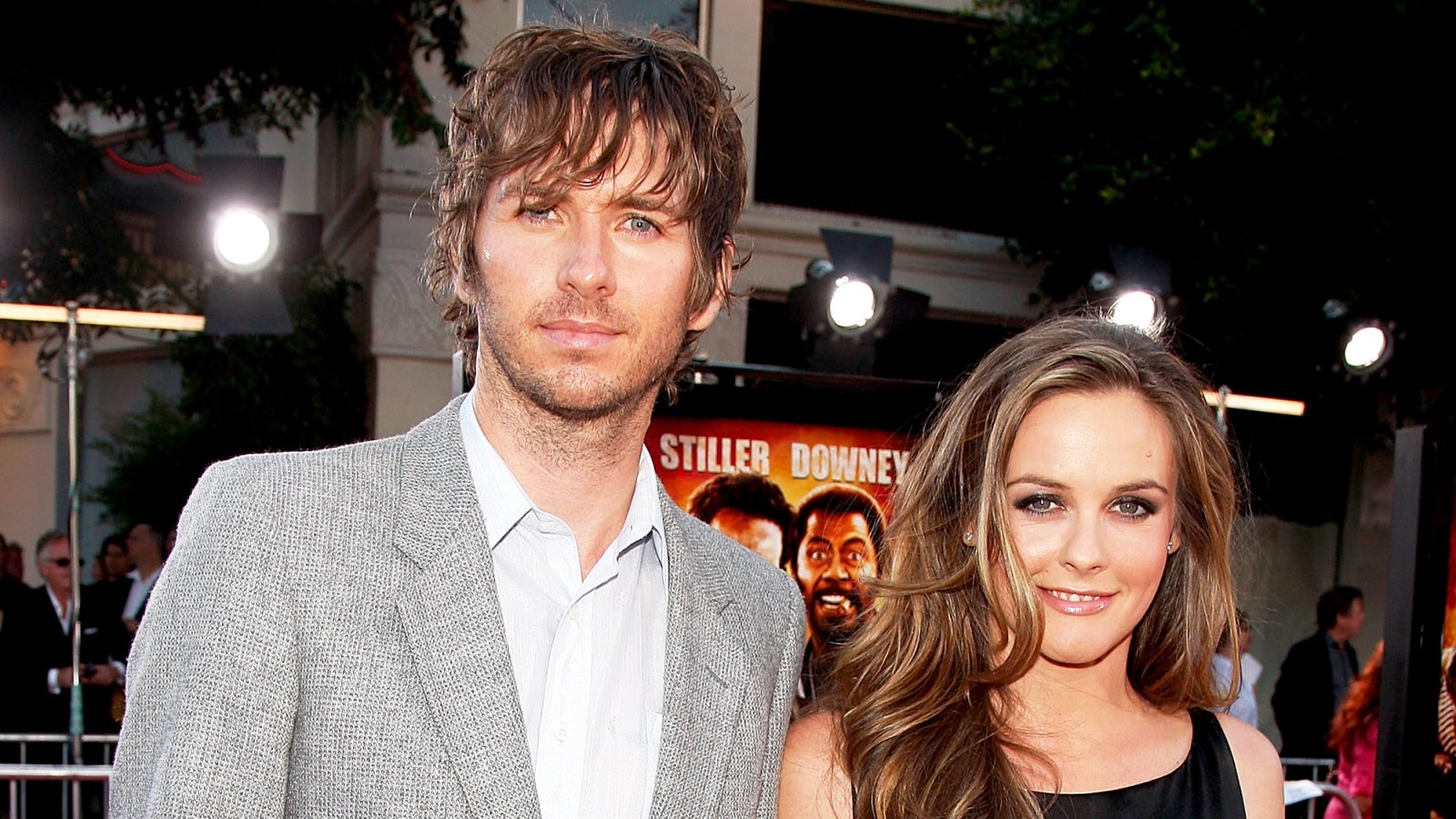 Christopher Jarecki and Alicia Silverstone arrive at the 2008 Los Angeles Premiere of "Tropic Thunder" at the Mann's Village Theater in Los Angeles, California.