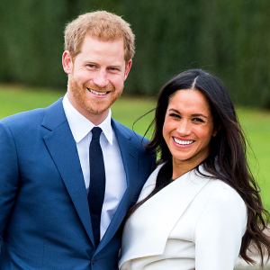Prince Harry and Meghan Markle during an official photocall to announce their engagement at The Sunken Gardens at Kensington Palace on November 27, 2017 in London, England.
