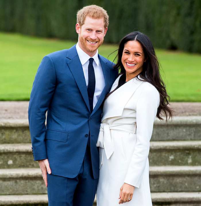 Prince Harry and Meghan Markle during an official photocall to announce their engagement at The Sunken Gardens at Kensington Palace on November 27, 2017 in London, England.