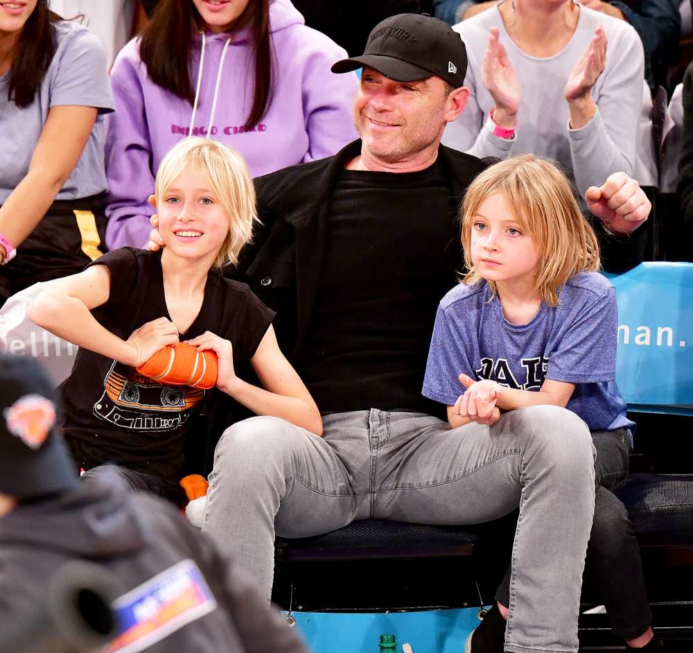Liev Schreiber with sons Alexander and Samuel attend the Orlando Magic Vs New York Knicks 2017 game at Madison Square Garden in New York City.