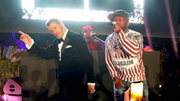 John Travolta and 50 Cent on stage during the party in Honour of John Travolta's receipt of the Inaugural Variety Cinema Icon Award during the 71st annual Cannes Film Festival on May 15, 2018 in Cap d'Antibes, France.