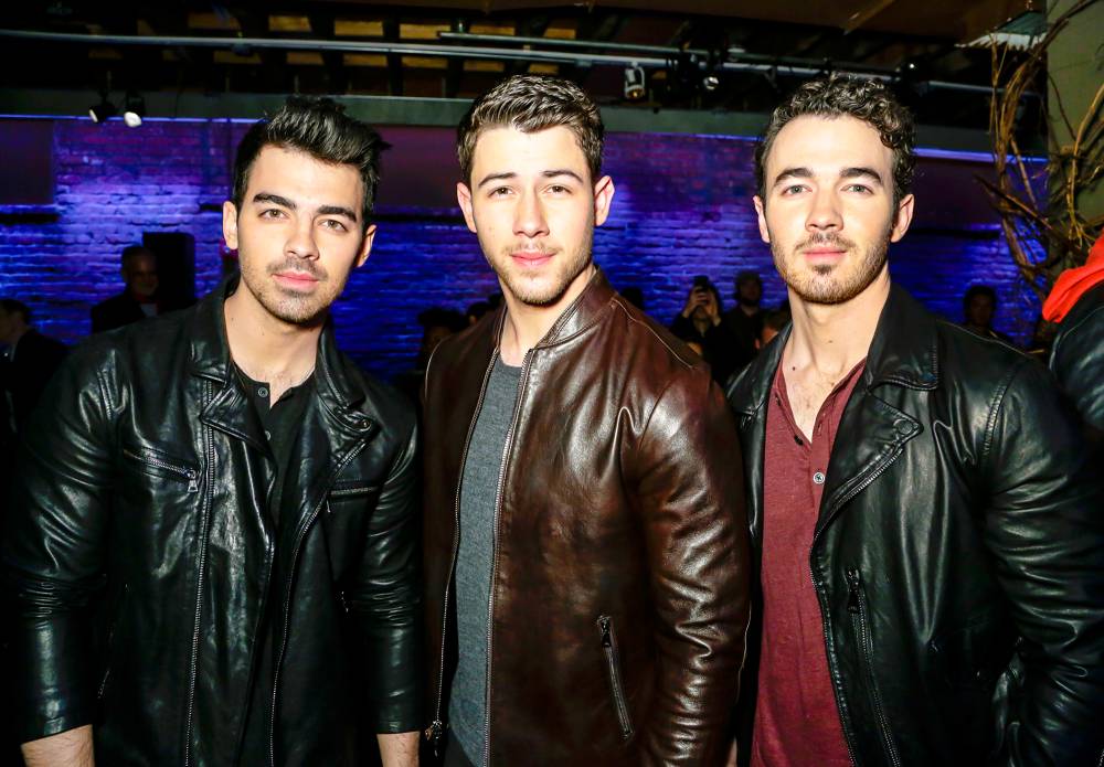 Joe Jonas, Nick Jonas and Kevin Jonas attend John Varvatos Fall/Winter 2018 Show at The Angel Orensanz Foundation in New York City.