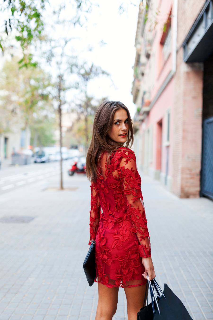 woman in a red dress going on date