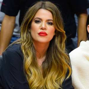 Khloe Kardashian attends a basketball game
