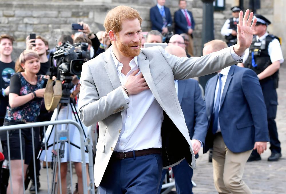 Prince Harry Greets Well Wishers Outside Windsor