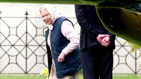 The Queen arrives at Kensington Palace by helicopter to meet Prince Louis for the first time on April 30, 2018.