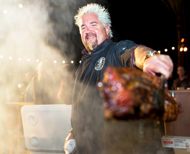 Guy Fieri grilling at the 2016 Food Network & Cooking Channel South Beach Wine & Food 2016 Festival Presented By FOOD & WINE at Surfcomber Hotel in Miami Beach, Florida.