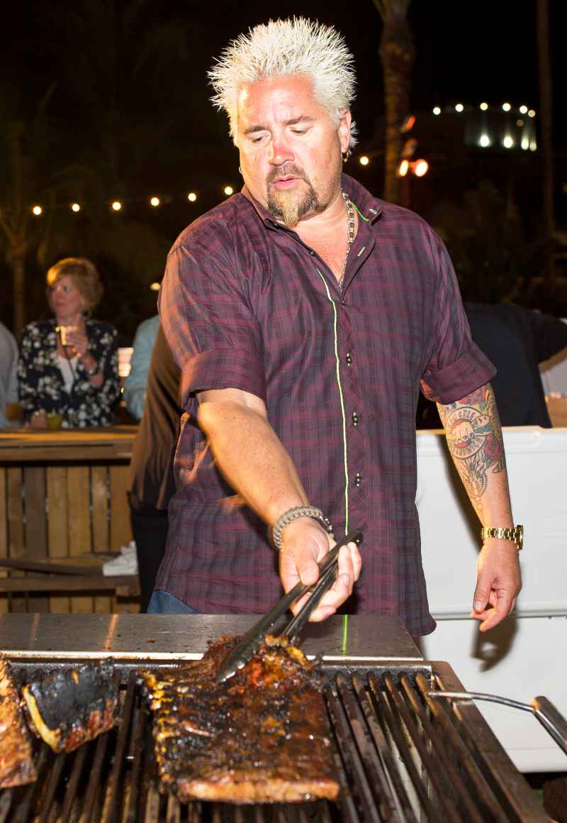 Guy Fieri grilling at the 2016 Food Network & Cooking Channel South Beach Wine & Food Festival Presented By FOOD & WINE at Surfcomber Hotel in Miami Beach, Florida.