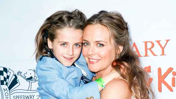 Alicia Silverstone and her son Bear appear at the 2017 premiere of Diary of a Wimpy Kid The Long Haul at the Indianapolis Motor Speedway in Indianapolis, Indiana.