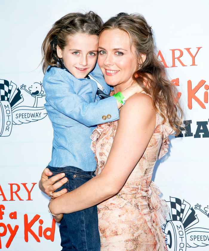 Alicia Silverstone and her son Bear appear at the 2017 premiere of Diary of a Wimpy Kid The Long Haul at the Indianapolis Motor Speedway in Indianapolis, Indiana.