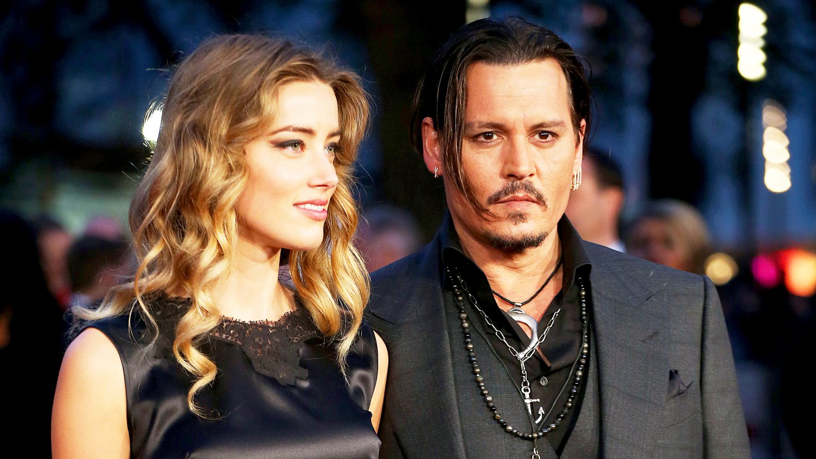 Amber Heard and Johnny Depp attend a screening of 'Black Mass' during the BFI London Film Festival at Odeon Leicester Square in London, England.