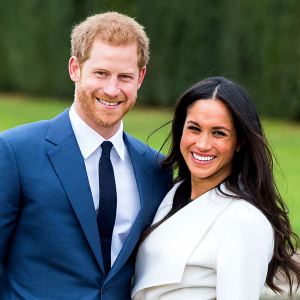 Prince Harry and Meghan Markle during an official photocall to announce their engagement at The Sunken Gardens at Kensington Palace on November 27, 2017 in London, England.