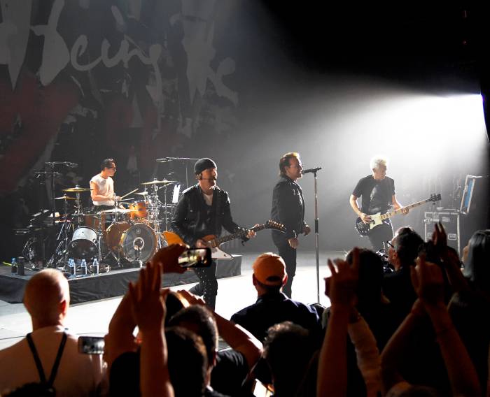 U2 performs on stage during SiriusXM’s private concert at the Apollo Theater in Harlem, New York, on June 11, 2018.
