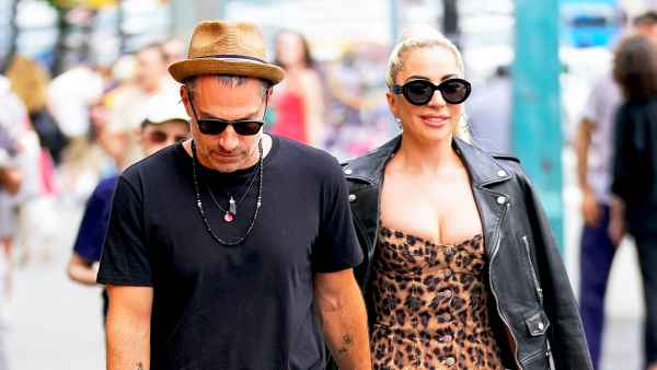 Lady Gaga and Christian Carino walk to her studio on June 28, 2018 in New York City.