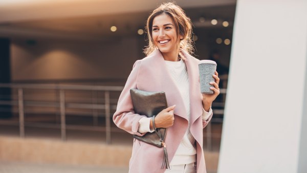 woman holding clutch