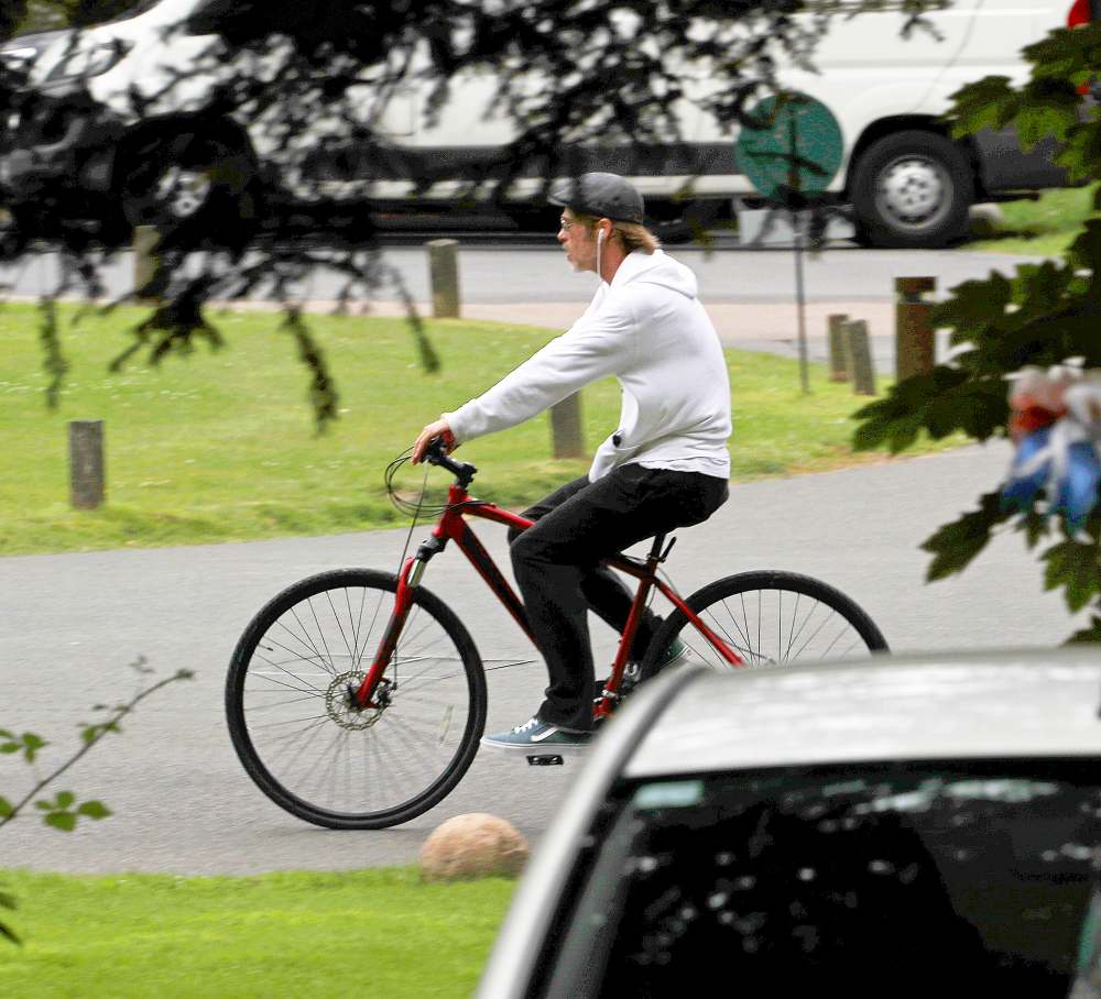 Brad Pitt goes for a bike ride in the U.K. on June 13, 2018.