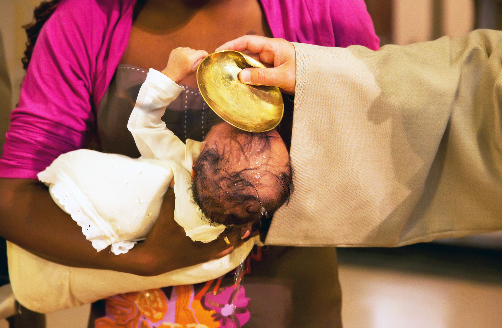 Priest Baby Baptism