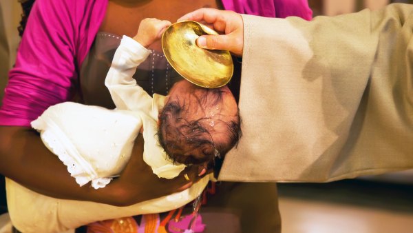 Priest Baby Baptism