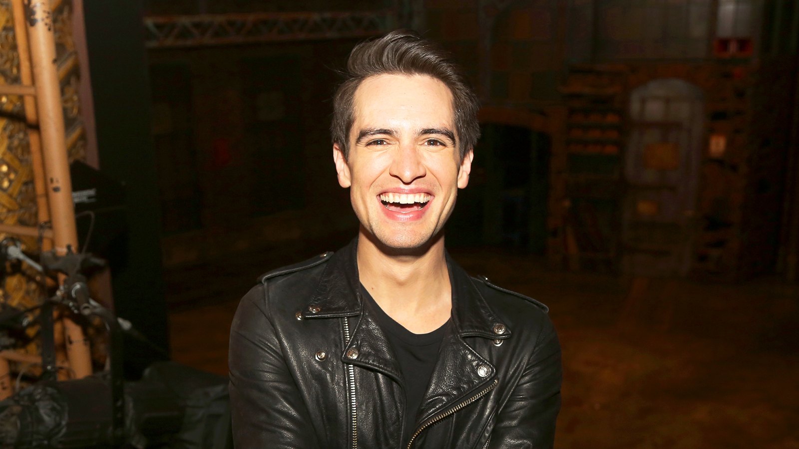 Brendon Urie poses at a photo call for his broadway debut in the hit musical "Kinky Boots" on Broadway at The Al Hirschfeld Theatre in New York City.