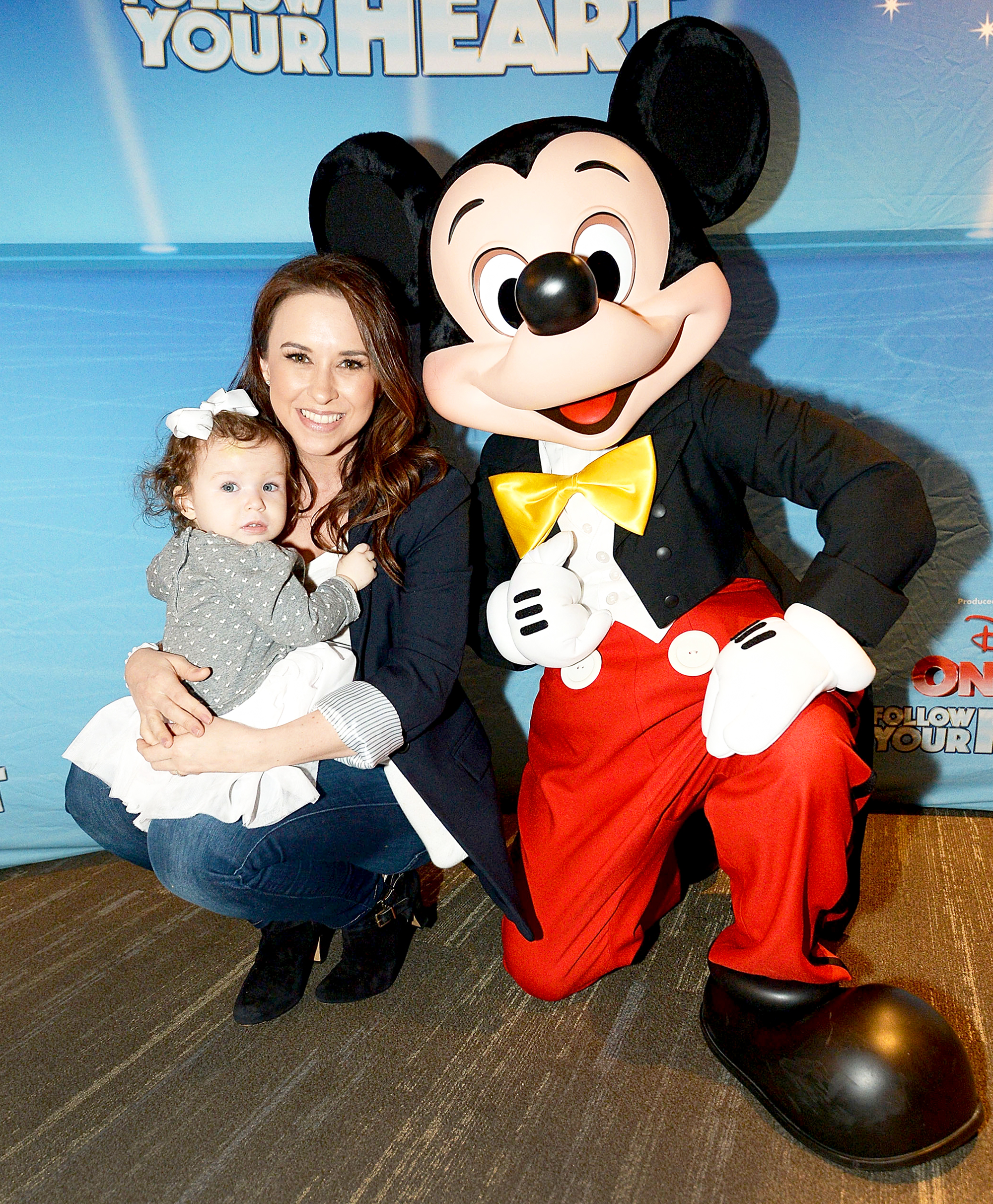 Lacey Chabert with her daughter Julia and Mickey Mouse attend 2017 Disney On Ice: Follow Your Heart at Staples Center in Los Angeles, California.