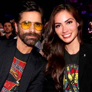 John Stamos and Caitlin McHugh