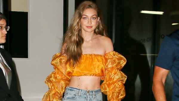 Gigi Hadid wears yellow puffy-sleeved crop top