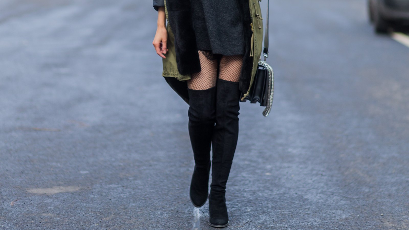 woman in over-the-knee boots