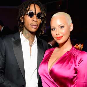 Recording artist Wiz Khalifa (L) and model-TV personality Amber Rose