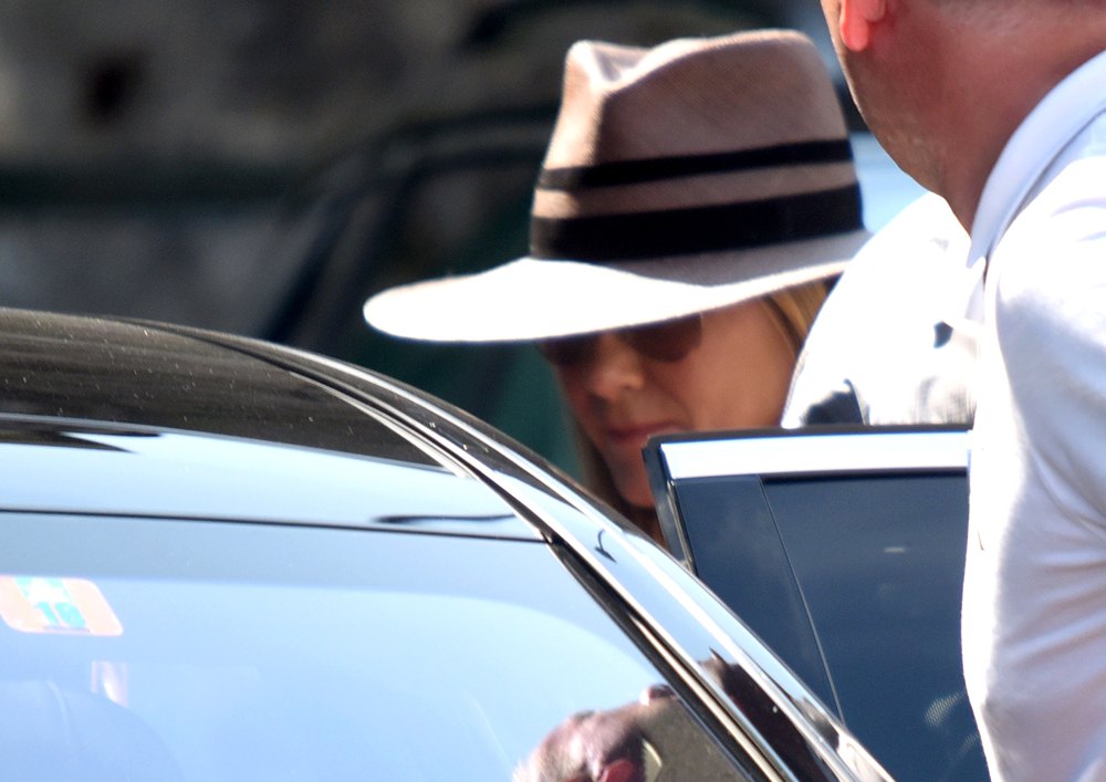 Jennifer Aniston spotted leaving Clooneys Villa in lake Como