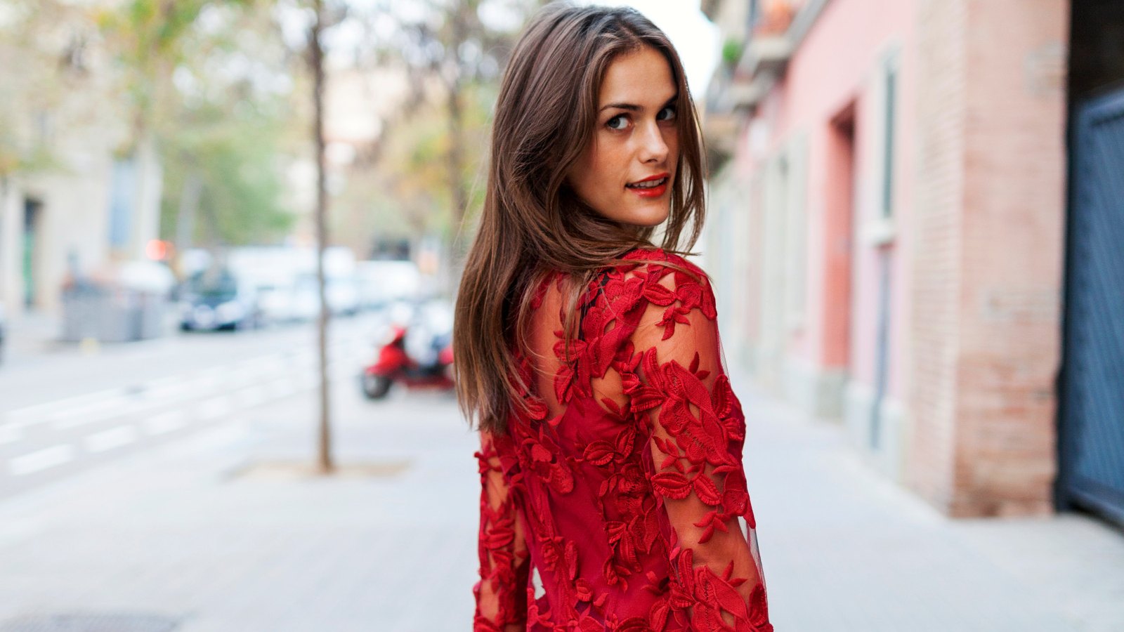 woman in red lace dress