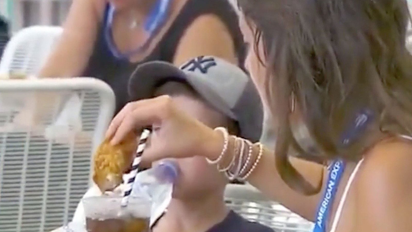 Woman Dips Chicken Tender in Soda