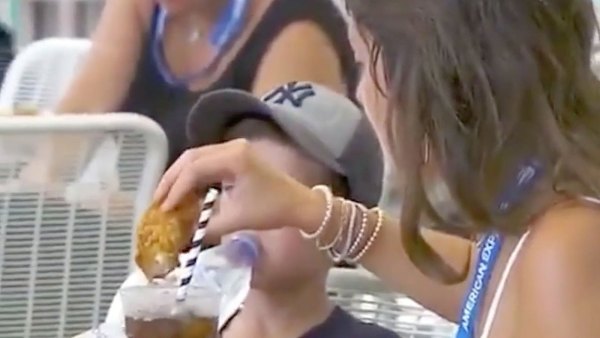 Woman Dips Chicken Tender in Soda