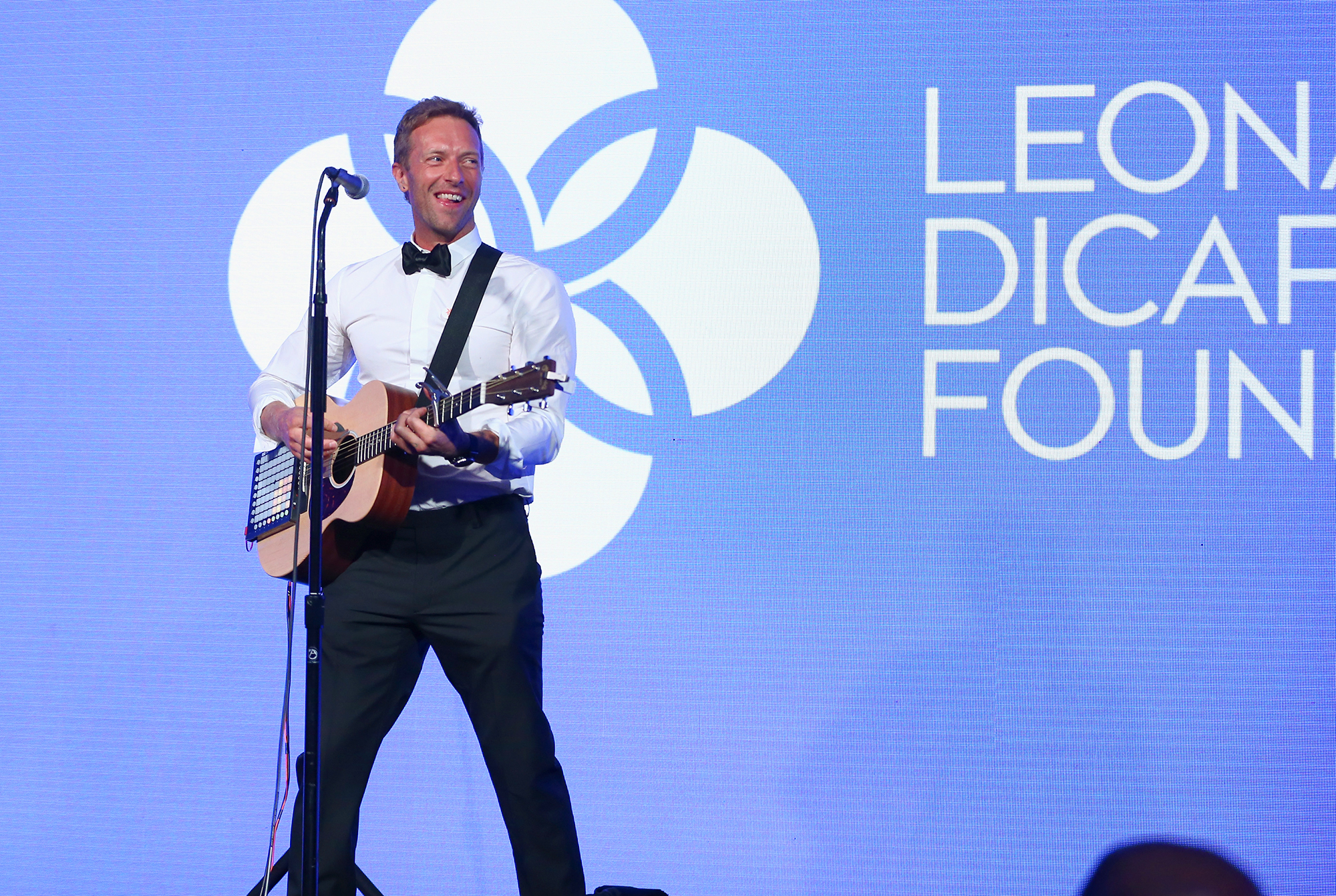Chris Martin performs onstage at the Leonardo DiCaprio Foundation Gala