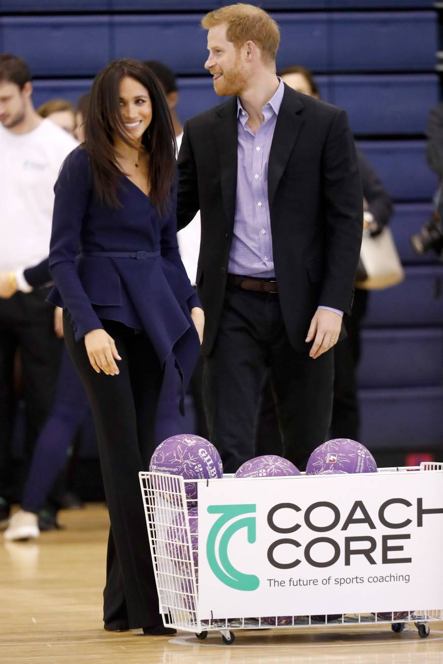 Megan Markle Plays Basketball in Oscar De La Renta and Heels at Royal Function With Prince Harry