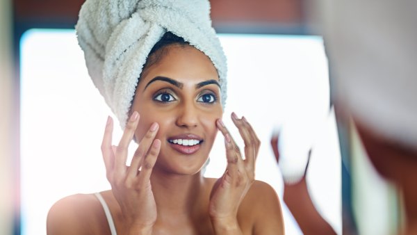 woman applying serum