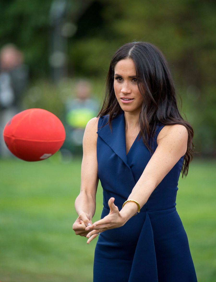 Pregnant Meghan Markle Plays Football