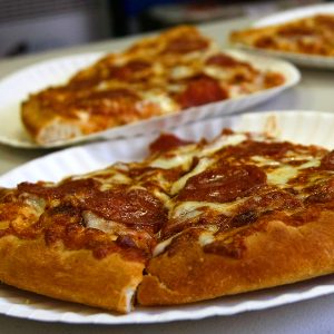 Slices of pizza made by the Little Caesars