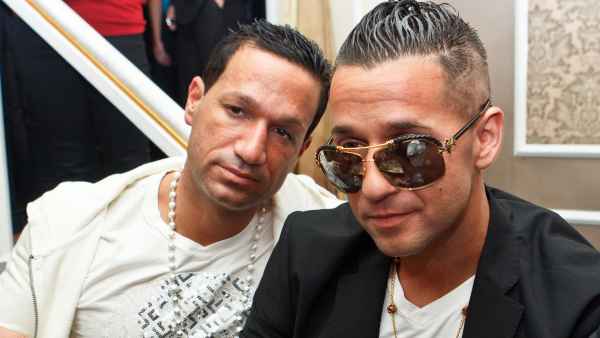 Television personality Mike "the Situation" Sorrentino (R) and brother Marc Sorrentino (L)