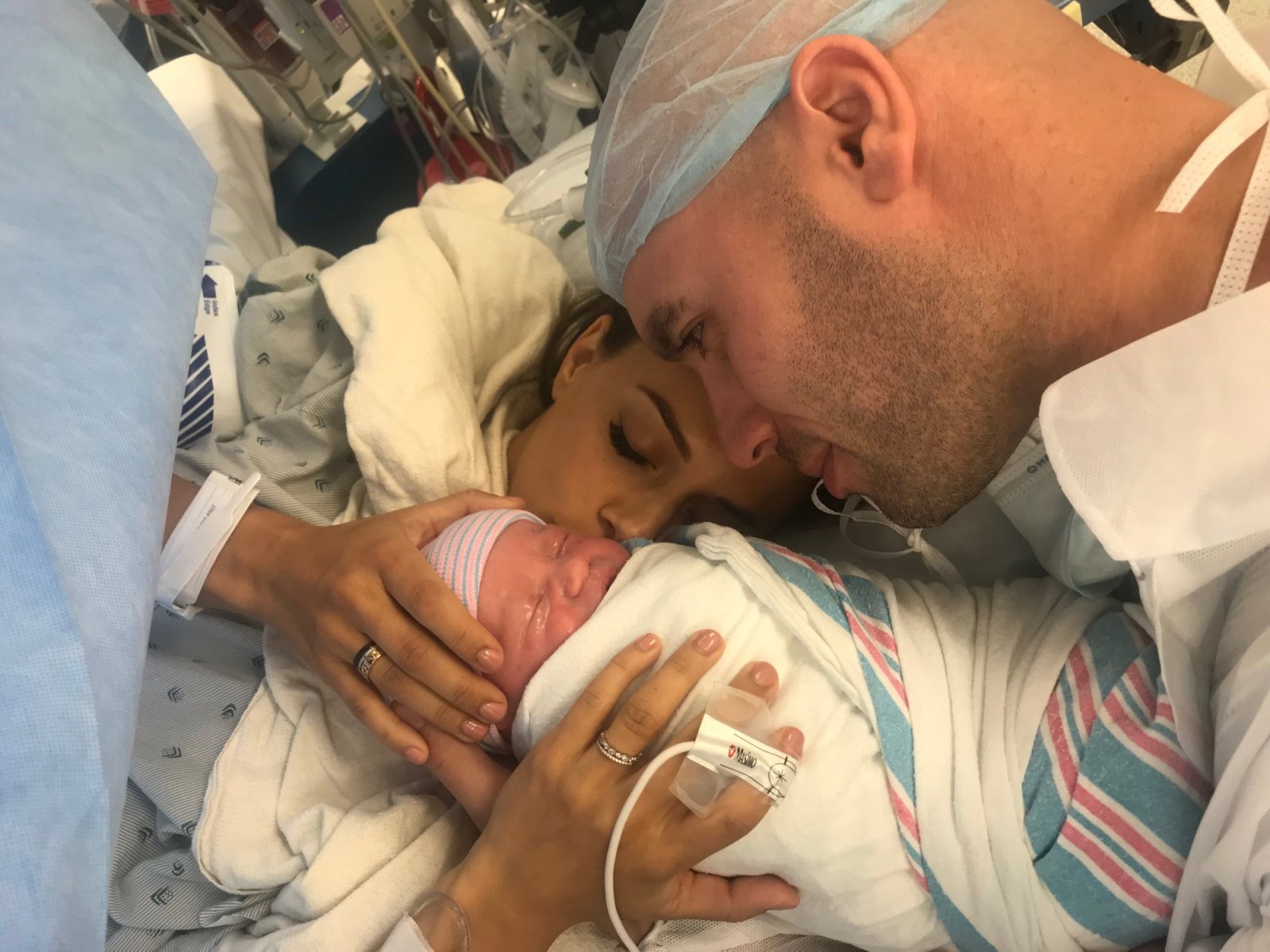 Jana Kramer and Michael Caussin with new baby